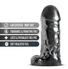 Black realistic dildo with metallic sheen. Featuring a large rounded head, veins along the straight extra thick shaft, and large realistic balls. Smooth flat base. Additional images show alternate angles.