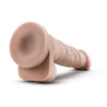 Vanilla skin tone ultra realistic dildo with a large bulbous head that is slightly tinted in a blush color for a lifelike look and veins along the straight but flexible shaft. Suction cup base. Additional images show alternate angles.
