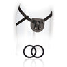 Black harness with faux leather backing. Adjustable nylon waist and leg straps for fit and stability. Includes 2 silicone O-rings. Additional images show alternate angles.