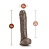 Chocolate skin tone ultra realistic dildo with a realistic head, many veins along the straight but flexible shaft and realistic balls. Longer and thicker than average. Suction cup base. Additional images show alternate angles.
