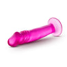 Translucent pink realistic dildo with a large bulbous head. Featuring skin folds under the head and very subtle veins on a straight shaft. Tapers to a slightly thinner diameter near the suction cup base.  Additional images show alternate angles.