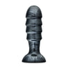 An extra large black anal plug with a carbon metallic sheen. This plug features four ridges that flare out and back in significantly for an extreme sensation. Featuring a flared circular base for safety with an opening that makes it compatible with any Lock On accessory. Additional images show alternate angles.