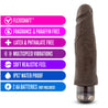 This chocolate skin tone vibrating dildo has an ultra realistic shape that offers significant girth, with a subtly defined head and veins along the shaft. Twist dial on bottom to adjust intensity. Additional images show alternate angles.