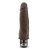 This chocolate skin tone vibrating dildo has an ultra realistic shape that offers significant girth, with a subtly defined head and veins along the shaft. Twist dial on bottom to adjust intensity. Additional images show alternate angles.