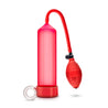 Red cylinder that connects to a squeezable ball pump by a red flexible hose. Includes red pump sleeve and stretchy cock ring.  Additional images show alternate angles.