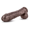 Chocolate skin tone ultra realistic dildo with a realistic head, many veins along the straight but flexible shaft and realistic balls. Longer and thicker than average. Suction cup base. Additional images show alternate angles.
