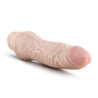 Vanilla skin tone vibrating dildo has an ultra realistic shape, with a defined but tapered head and veins along the shaft. Twist dial on bottom to adjust intensity. Additional images show alternate angles.