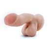 Vanilla skin tone realistic dildo. Featuring a realistic head. Head is slightly tinted in a pink color for a lifelike look. Veins along the shaft, which has an upward curve. Realistic balls. Suction cup base. Additional images show alternate angles.