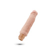 Ultra realistic, vanilla skin tone vibrating dildo with a defined head and subtle veins along the shaft. Long shaft with a very slight curve. Twist dial on bottom to adjust intensity.  Additional images show alternate angles.