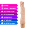Vanilla skin tone ultra realistic vibrating dildo. Pronounced curved head and veins along the shaft. Twist dial on bottom to adjust intensity. Additional images show alternate angles.