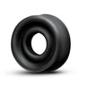 Donut shaped black silicone sleeve that fits around the edge of Performance penis cylinders for a tight seal and comfort. Additional images show alternate angles.
