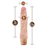 Vanilla skin tone vibrating dildo. Pronounced head with skin folds under the head and subtle veins along the shaft. Twist dial on bottom to adjust intensity. Additional images show alternate angles.