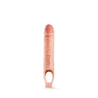 Vanilla skin tone ultra realistic hollow penis extender with a strap at the base that goes around the scrotum for stability. Sheath is very plush and has a veined texture and slightly pink colored head for a lifelike look.   Additional images show alternate angles.