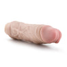 Vanilla skin tone vibrating dildo. Pronounced head with skin folds under the head and subtle veins along the shaft. Twist dial on bottom to adjust intensity. Additional images show alternate angles.