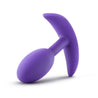 Smooth purple silicone butt plug with tapered time, slim body, narrow neck and thin flared base for comfort and safety. Contains a weighted ball inside the body of the plug that moves around with the body's movement. Additional images show alternate angles.