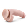 Vanilla skin tone ultra realistic dildo. Featuring a pronounced bulbous head, subtle veins along the slightly downwardly curved, thicker than average shaft, and realistic balls. Suction cup base. Additional images show alternate angles.