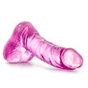Translucent pink realistic dildo. Small tapered head for easy insertion. Many veins along the slightly upwardly curved shaft. Realistic balls. Smooth flat base. Additional images show alternate angles.