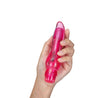 Pink vibrator. Petite size, slight curves and tapered tip, variable intensities controlled by twist dial. Additional images show alternate angles.