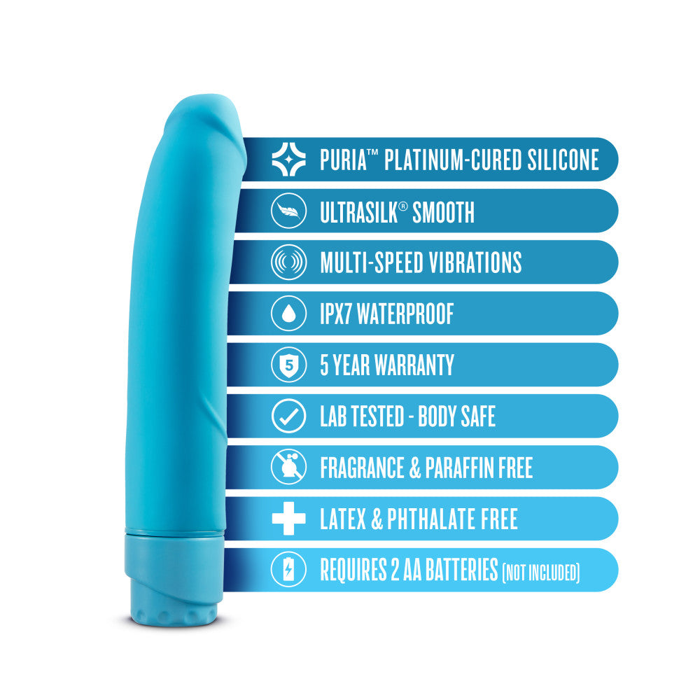 Blue semi realistic vibrating dildo. Pronounced curved head, smooth shaft with a subtle vein at the bottom of the shaft. Twist dial on bottom to adjust intensity. Additional images show alternate angles.