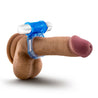 Blue stretchy cock ring with 3 small vents and soft TPE beads around the ring. Connected to a removable small vibrating silver bullet on top that has soft ridges for added pleasure to the receiver or wearer, depending on use. Bullet has a single button on the bottom of the cap for easy operation. Additional images show alternate angles.