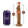 Mocha skin tone realistic dildo with a pronounced rounded head, skin folds beneath the head, subtle veins along the straight but flexible shaft, and a suction cup base. Additional images show alternate angles.
