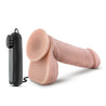 Vibrating realistic cock with suction cup. Vanilla skin tone with pronounced head, veins along the shaft, and plush balls. Wired remote with twist dial to adjust intensity. Additional images show alternate angles.