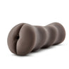 Chocolate skin tone, open-ended stroker, palm-sized, featuring small butt cheeks and an anal opening. Ribbed internal canal. Cylinder shaped body features finger grooves for secure grip. Additional images show alternate angles.