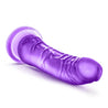 Translucent purple dildo with a slim tapered realistic head for easy insertion and subtle veins along the slightly upwardly curved shaft. Suction cup base. Additional images show alternate angles.