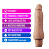 Ultra realistic mocha skin tone vibrating dildo with a subtly defined head and veins along the shaft. Shaft is slightly flared and is thicker at  the base. Twist dial on bottom to adjust intensity.  Additional images show alternate angles.