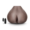 Life sized chocolate skin tone ultra realistic ass with anal and vaginal openings. Smooth skin like feel with ribbed tunnel for additional stimulation. Additional images show alternate angles.