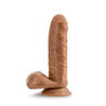 Mocha skin tone realistic uncut dildo. Featuring a smooth rounded head covered partially by foreskin, veins along a straight but flexible shaft, and realistic balls. Suction cup base. Foreskin and rest of dildo are one piece, foreskin doesn't move or pull back. Additional images show alternate angles.
