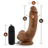 Vibrating realistic cock with suction cup. Mocha skin tone with pronounced head, veins along the slightly downwardly curved shaft, and plush balls. Wired remote with twist dial to adjust intensity. Additional images show alternate angles.