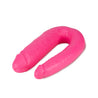 Pink double ended dildo with a realistic head on either end. One end is thicker than the other. Veins all along the U-shaped shaft that is very flexible. Additional images show alternate angles.