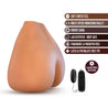 Life sized mocha skin tone ultra realistic ass with anal and vaginal openings. Smooth skin like feel with ribbed tunnel for additional stimulation. Includes removable corded vibrating bullet. Additional images show alternate angles.