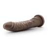 Chocolate skin tone ultra realistic dildo. Featuring a tapered head for easy insertion and veins along the straight but flexible shaft. Suction cup base. Additional images show alternate angles.