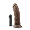Chocolate skin tone with subtle rounded head and veins along the shaft, which has a slight upward curve. Suction cup base. Twist dial on wired remote to adjust intensity. Additional images show alternate angles.
