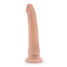 Vanilla skin tone dildo with a slim tapered realistic head for easy insertion and subtle veins along the slightly upwardly curved shaft. Head is slightly tinted in a blush color for a lifelike look. Suction cup base. Additional images show alternate angles.