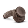 Chocolate skin tone ultra realistic dildo. Featuring a realistic head, veins along the slightly downwardly curved shaft, and round realistic balls. Suction cup base. Additional images show alternate angles.