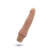 This ultra realistic mocha skin tone vibrating dildo features a very subtle head and subtle veins along the shaft. Shaft is slim and long with a slight curve. Twist dial on bottom to adjust intensity.  Additional images show alternate angles.