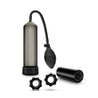 A 4 piece kit including a black squeeze ball penis pump with black transparent cylinder, pump sleeve, hose, and bulb. Also includes 2 stretchy black gear-shaped cock rings and a sleek black stroker that is open on both ends, has a smooth outside, and soft flexible nubs inside the canal for added stimulation. Additional images show alternate angles.