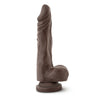 Chocolate skin tone ultra realistic dildo. Featuring a tapered realistic head for easy insertion, skin folds and veins along the straight but flexible shaft, and round realistic balls. Suction cup base. Additional images show alternate angles.