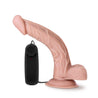 Vanilla skin tone with pronounced head and many veins along the shaft, which has a pronounced upward curve, and plush balls. Suction cup base. Twist dial on wired remote to adjust intensity. Additional images show alternate angles.