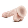 Vanilla skin tone realistic dildo. Small tapered head for easy insertion. Veins and skin folds along the straight but flexible shaft. Realistic balls. Suction cup base. Additional images show alternate angles.
