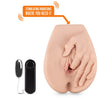 Vanilla skin tone vulva shaped masturbation sleeve with a realistic hand reaching down toward vaginal opening and one finger inserted into vagina. Slight crease at bottom to imply butt cheeks. Ribbed internal tunnel. Additional images show alternate angles.