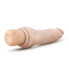 Vanilla skin tone vibrating dildo has an ultra realistic shape, with a defined but tapered head and veins along the shaft. Twist dial on bottom to adjust intensity. Additional images show alternate angles.