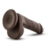 Chocolate skin tone realistic dildo. With a rounded head, subtle veins along the straight but flexible shaft, and realistic balls. Suction cup base. Additional images show alternate angles.