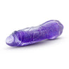 A semi realistic translucent purple sparkly vibrator with color shifting LED lights that glow in different colors when the vibrator is in use. Twist dial on bottom to adjust intensity. Additional images show alternate angles.