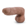 Mocha skin tone realistic dildo. Featuring a very subtle tapered head for easy insertion. Veins and skin folds along the straight shaft. Round realistic balls. Smooth flat base. Additional images show alternate angles.