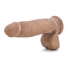Mocha skin tone ultra realistic dildo with a tapered realistic head for easy insertion and a smooth straight but flexible shaft. Realistic balls. Suction cup base. Additional images show alternate angles.