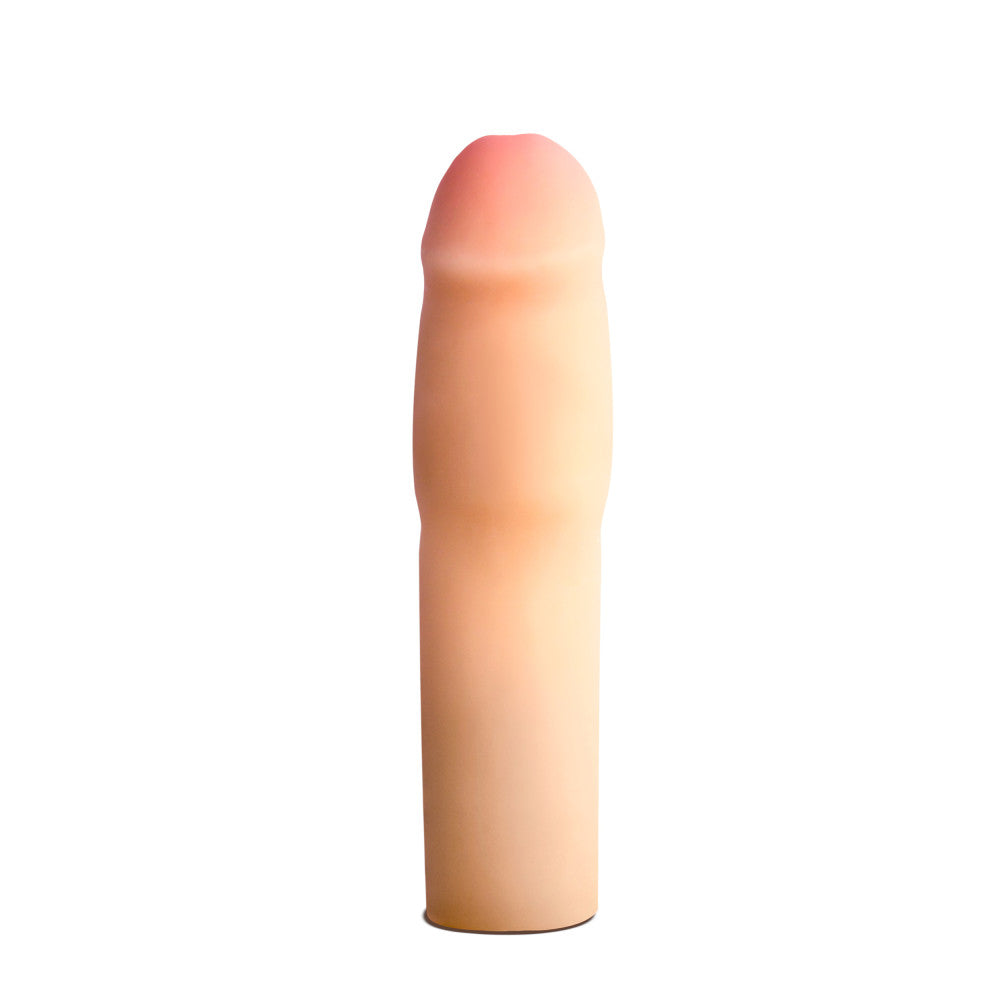 Vanilla skin tone hollow penis extender with a firm 1.5 inch tip to add length. Realistic head is slightly tinted in a pink color for a lifelike look. Soft and smooth body. Additional images show alternate angles.